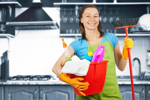 Cleaner washing shopfront windows in Waterloo