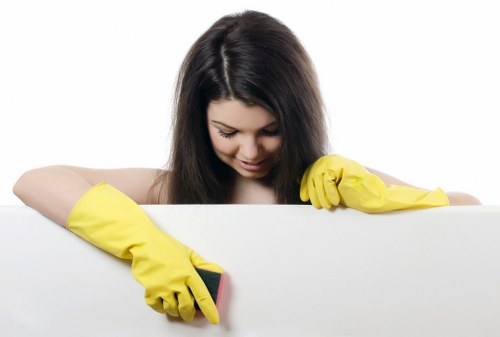 Technician reviewing carpet cleaning booking details and service requirements