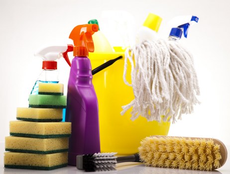 Professional upholstery cleaning tools used on a sofa in Waterloo